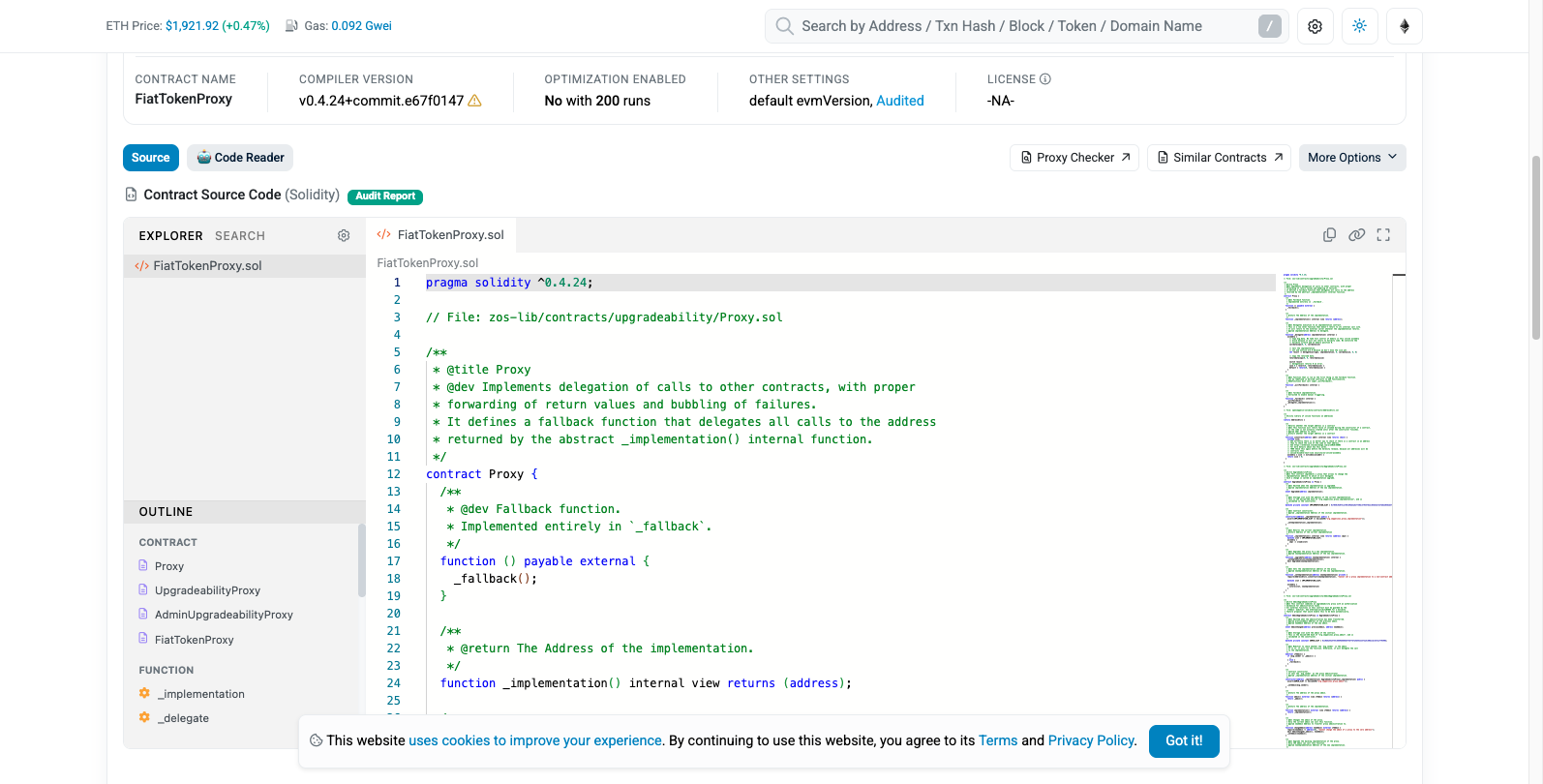 Etherscan contract source code tab for USDC, showing verified Solidity source with an Audit Report badge